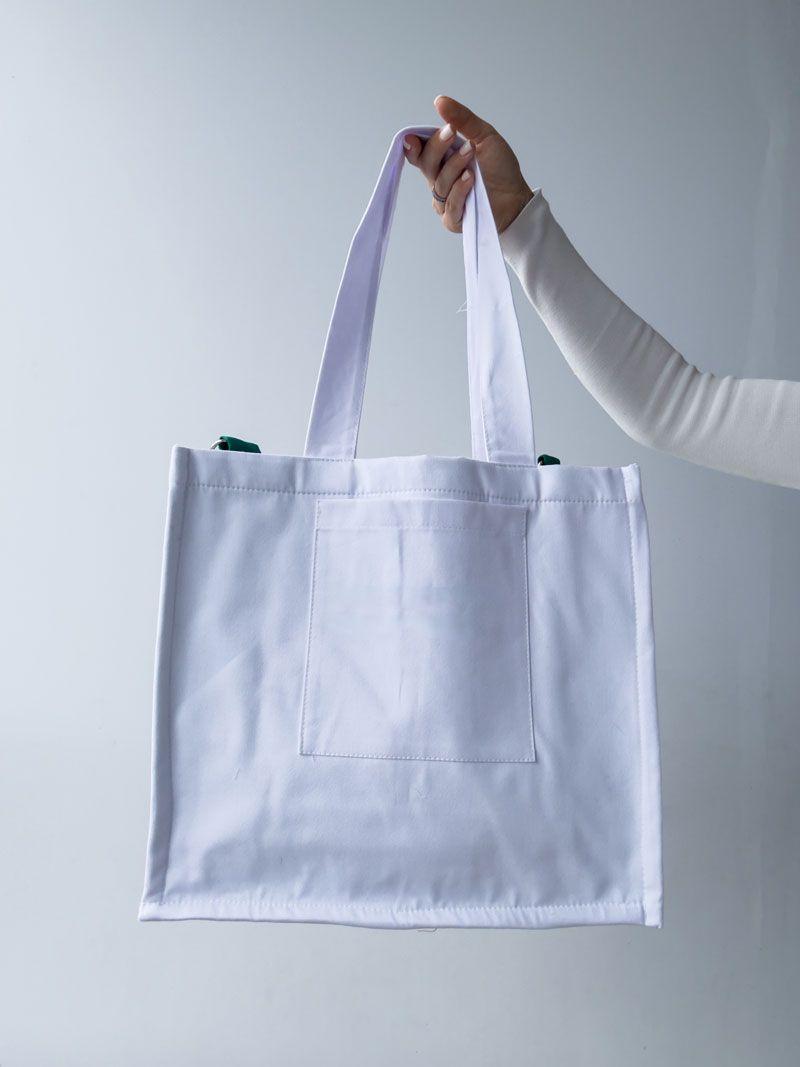 Білий шопер із бавовни з внутрішніми зеленими кишенями — стильна екосумка для покупок та щоденного використання без друку розмір: 38см х 35см х 15см