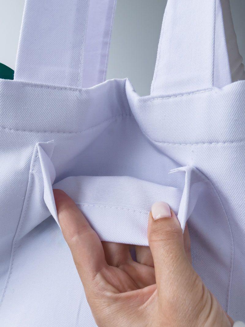 Білий шопер із бавовни з внутрішніми зеленими кишенями — стильна екосумка для покупок та щоденного використання без друку розмір: 38см х 35см х 15см