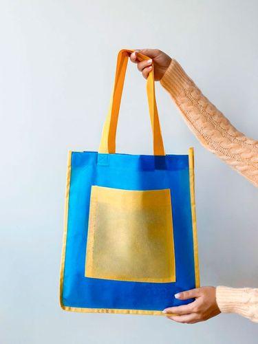 Торба сумка зі спанбонду флізеліну жовто блакитна з кишенею (Послуги)