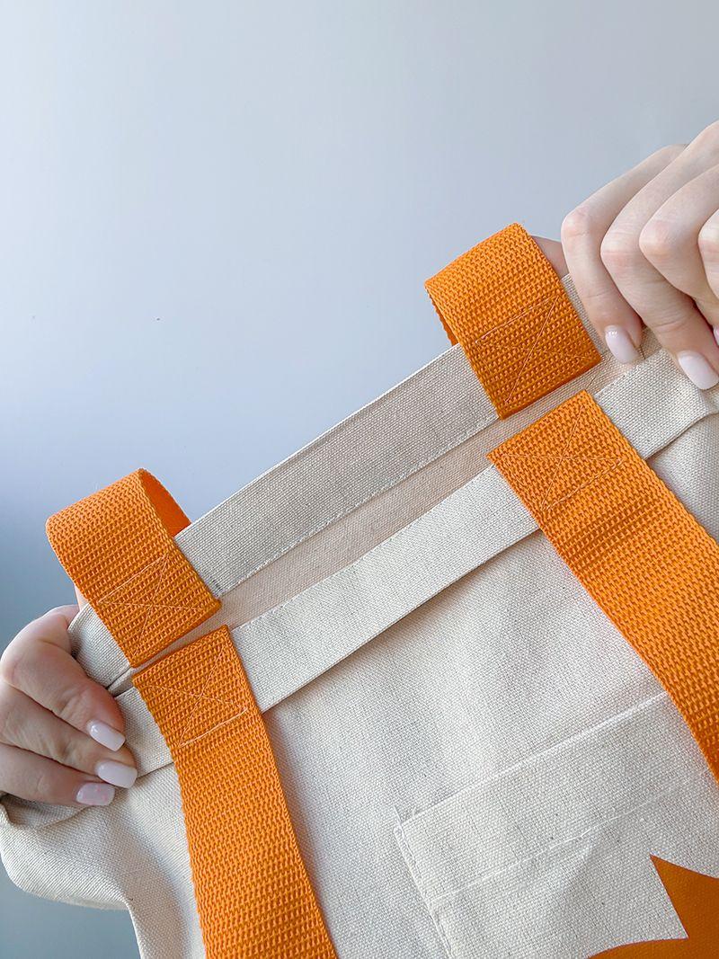 Світло-бежева натуральна сумка з кишенею та яскравими помаранчевими ручками, без друку, розмір: 38см х 42см