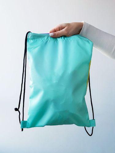 Яскравий рюкзак для змінки з водовідштовхувальної плащівки, без друку, розмір: 25см х 35см
