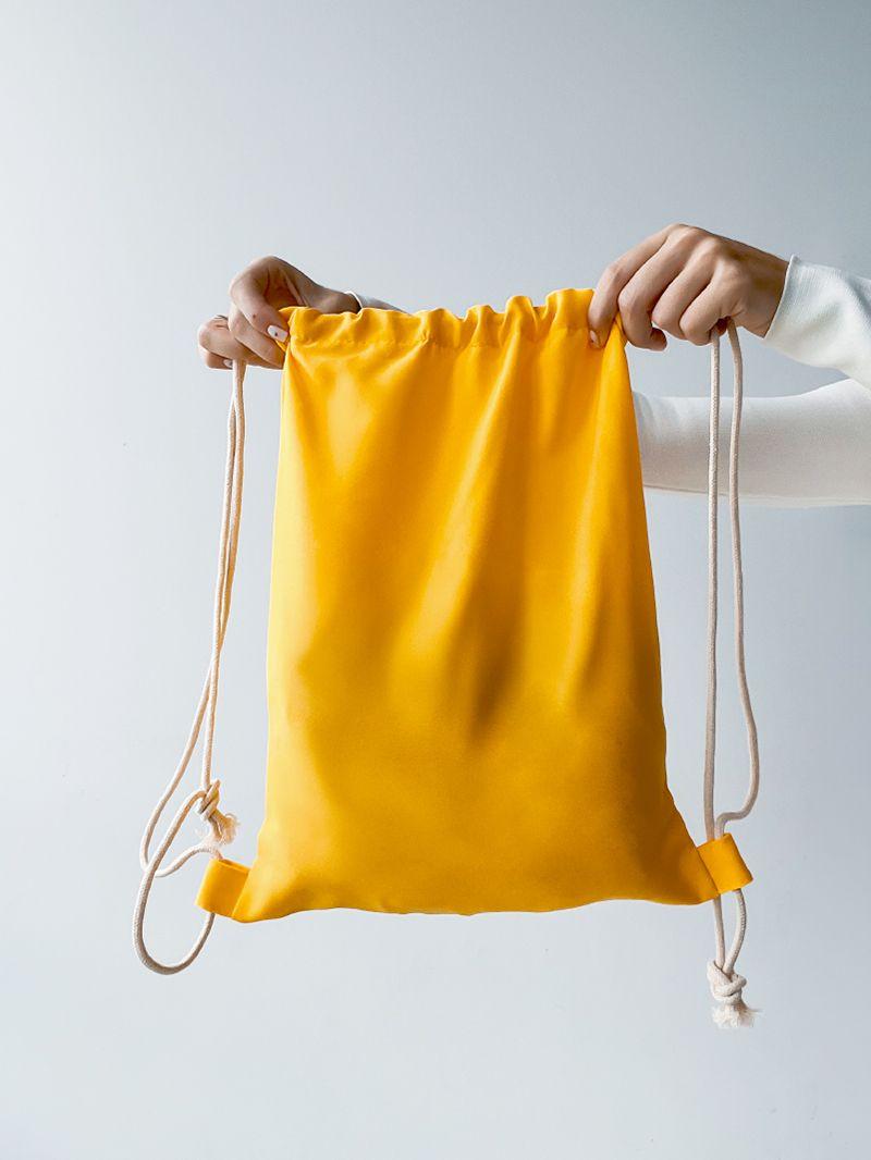 Яскравий жовтий рюкзачок для змінки, без друку, розмір: 30см х 40см