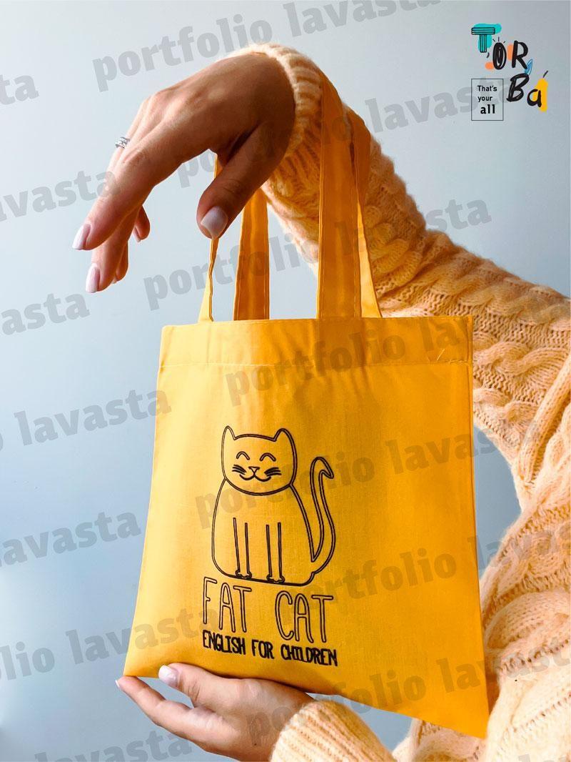 Маленька торба з тонкого котону жовтого кольору без друку