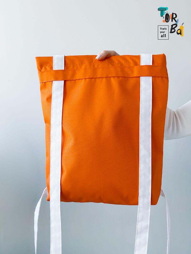 Помаранчева сумка з білими кишенями та світловідбивними вставками, на довгій зручній ручці, без друку, розмір: 36см х 40см х 8см