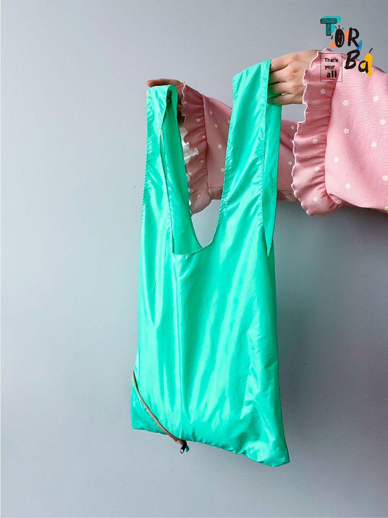 Складана сумка-пакет трансформер бірюзового кольору з плащівки,  міцний та стильний варіант для покупок і повсякденного використання. без друку Розмір: 40см х 60см