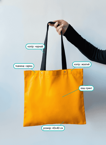 Orange tote bag with rivet handles