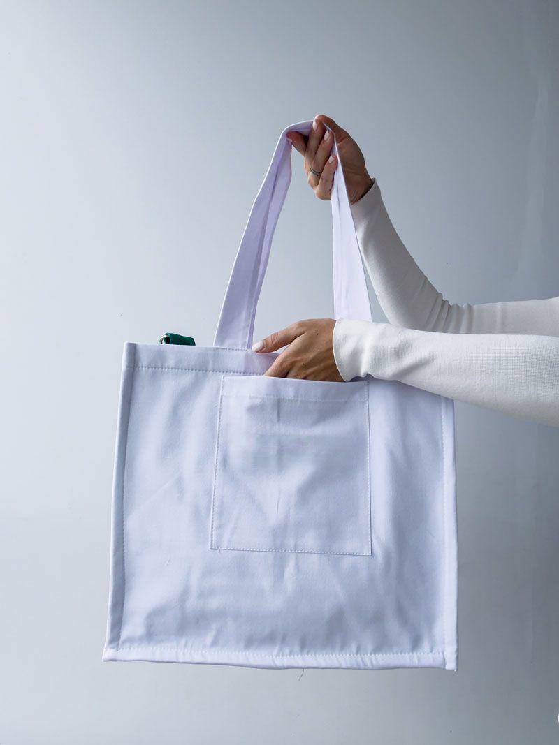 Білий шопер із бавовни з внутрішніми зеленими кишенями — стильна екосумка для покупок та щоденного використання без друку розмір: 38см х 35см х 15см
