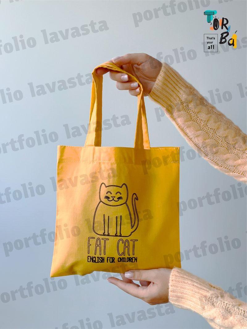 Маленька торба з тонкого котону жовтого кольору без друку