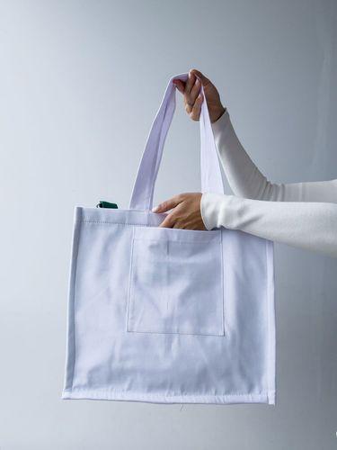 Білий шопер із бавовни з внутрішніми зеленими кишенями — стильна екосумка для покупок та щоденного використання без друку розмір: 38см х 35см х 15см