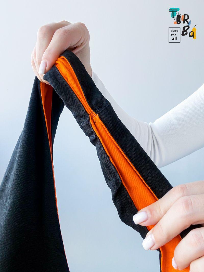 Черная сумка-пакет из натуральной ткани, с яркой оранжевой подкладкой, без печати, размер: 43см х 80см