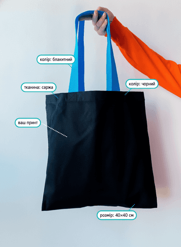 Black heavyweight cotton tote bag with blue handles