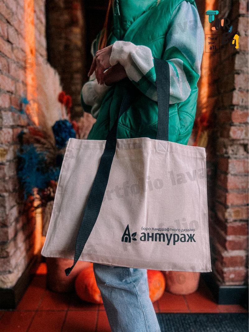Горизонтальна щільна котонова сумка з подовженою ручкою без друку